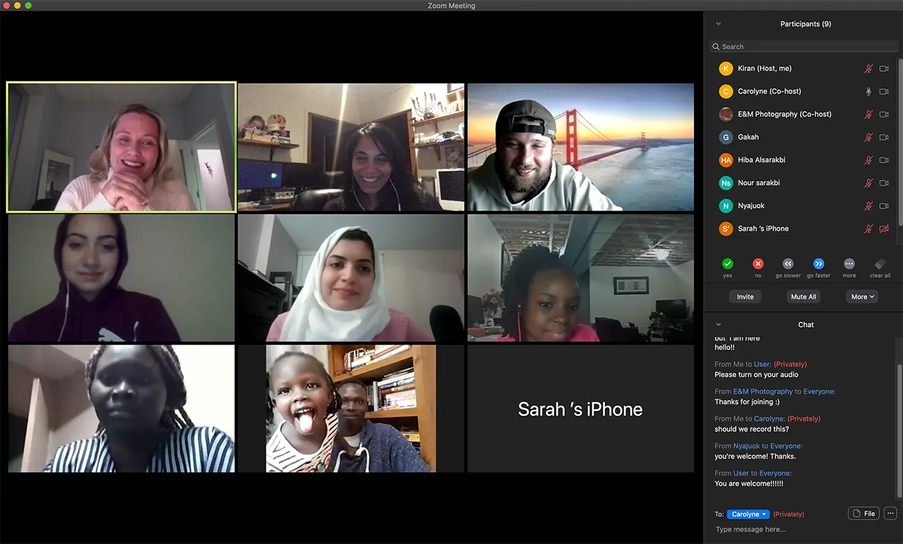 Zoom meeting with a grid of video participants and a participant list and chat panel on the right.